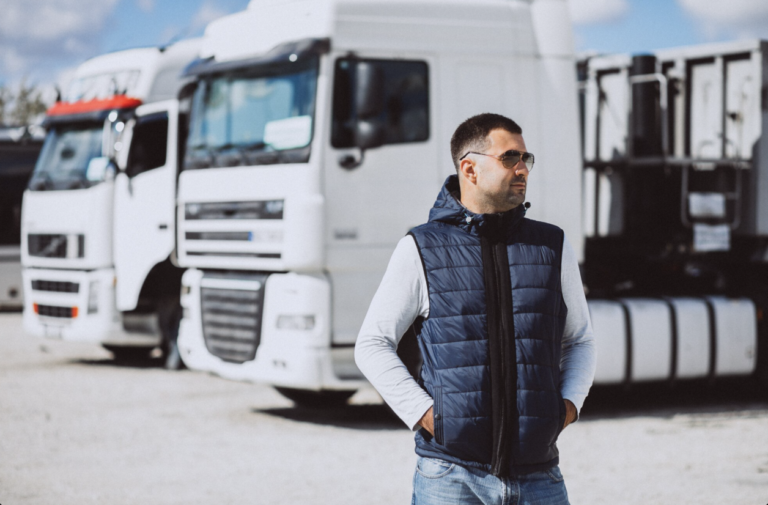 a man in the semi truck parking